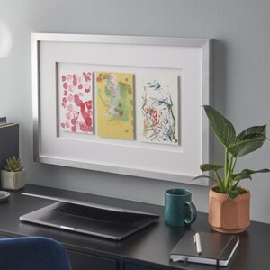 Kids drawings in a custom picture frame